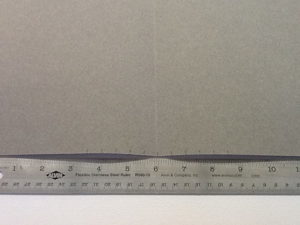 Measure along the top and bottom, starting at your fold and going out.  I used increments of 1/2 inch, but you can use any measurement you want.