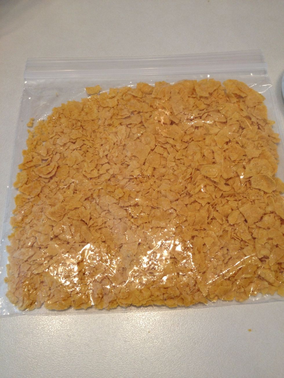 Measure and crush another cup of corn flakes.