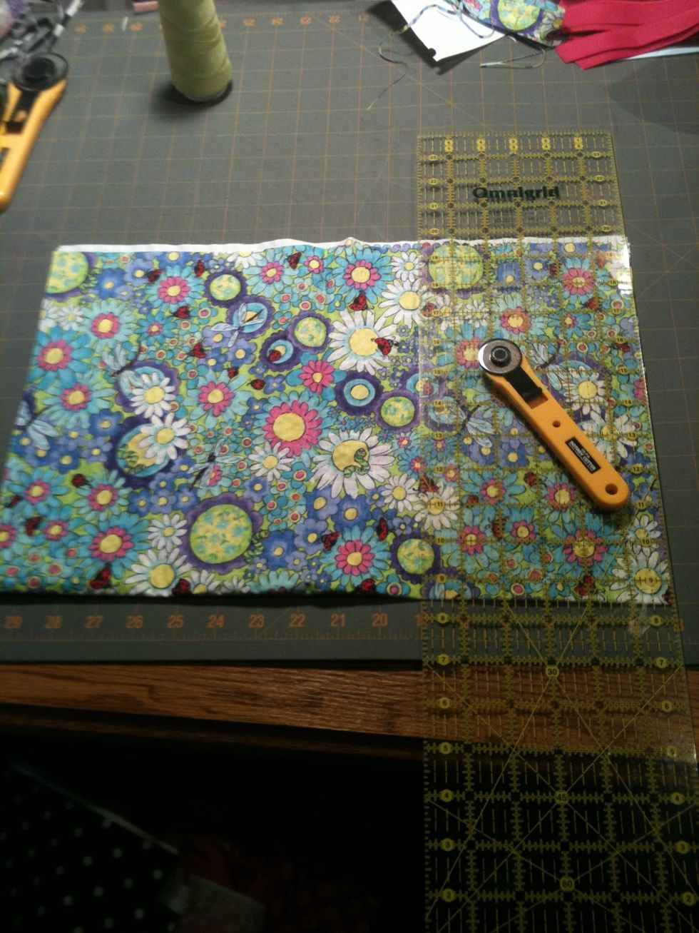 Measure and cut fabric: 18 inches for size 12/24 months. 20inches for size 2/3T. 22 inches for size 4/5.
