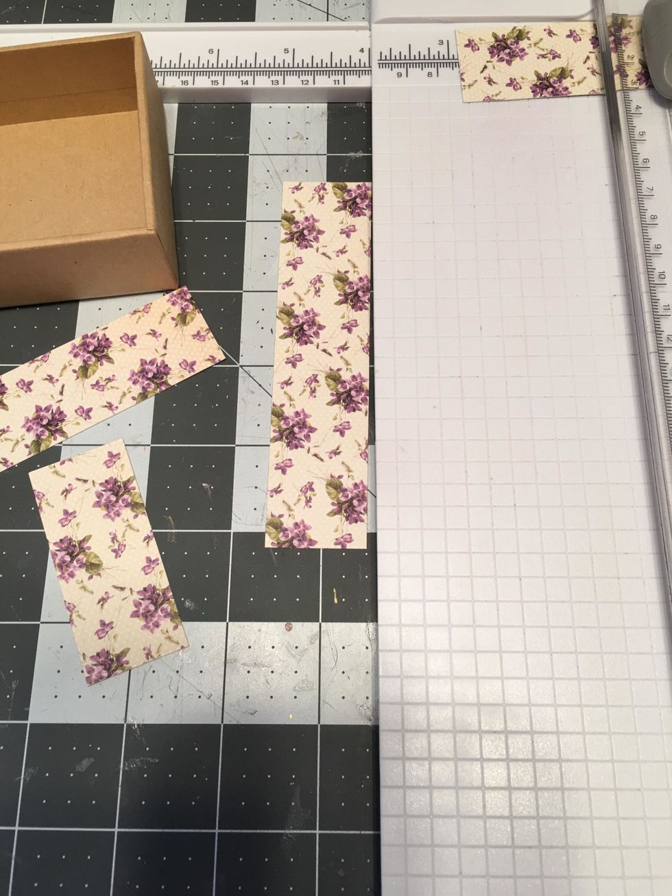 Measure and cut patterned paper to fit the sides of the box for the inside.