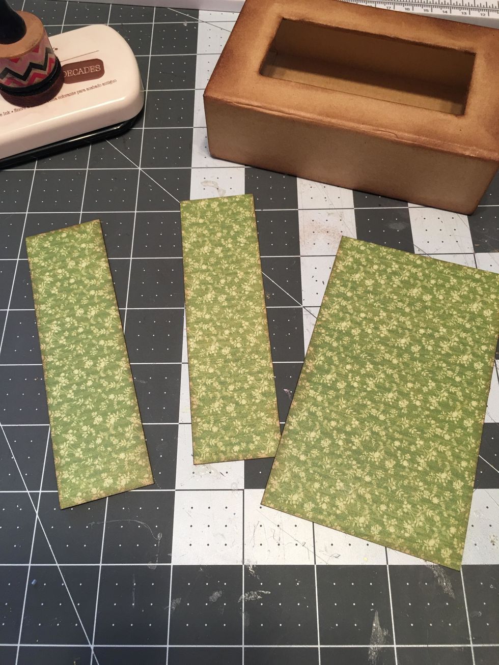 Measure and cut patterned papers to cover the outside of the box (2 sides and the bottom). Ink all the edges of the paper.