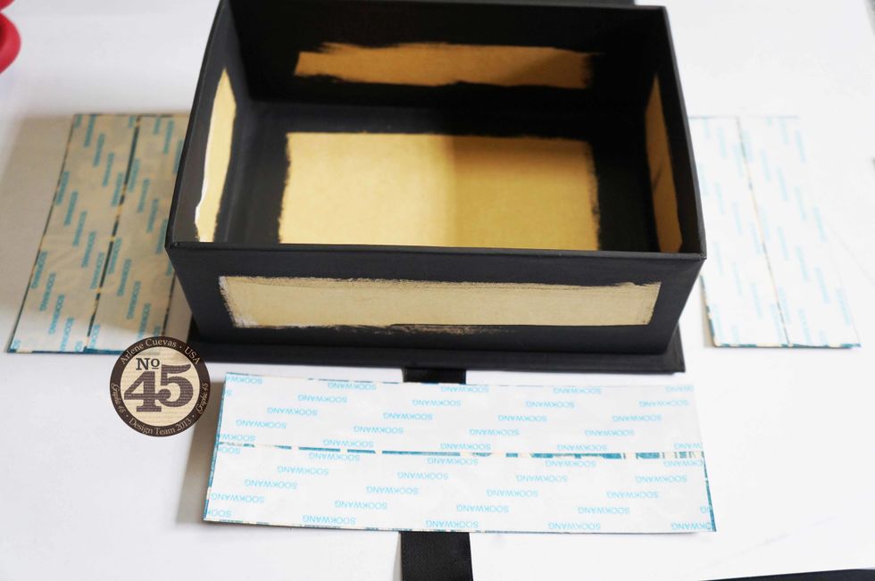 Measure and cut strips of design paper for the sides of your box. Add ScorTape, then adhere to the box.