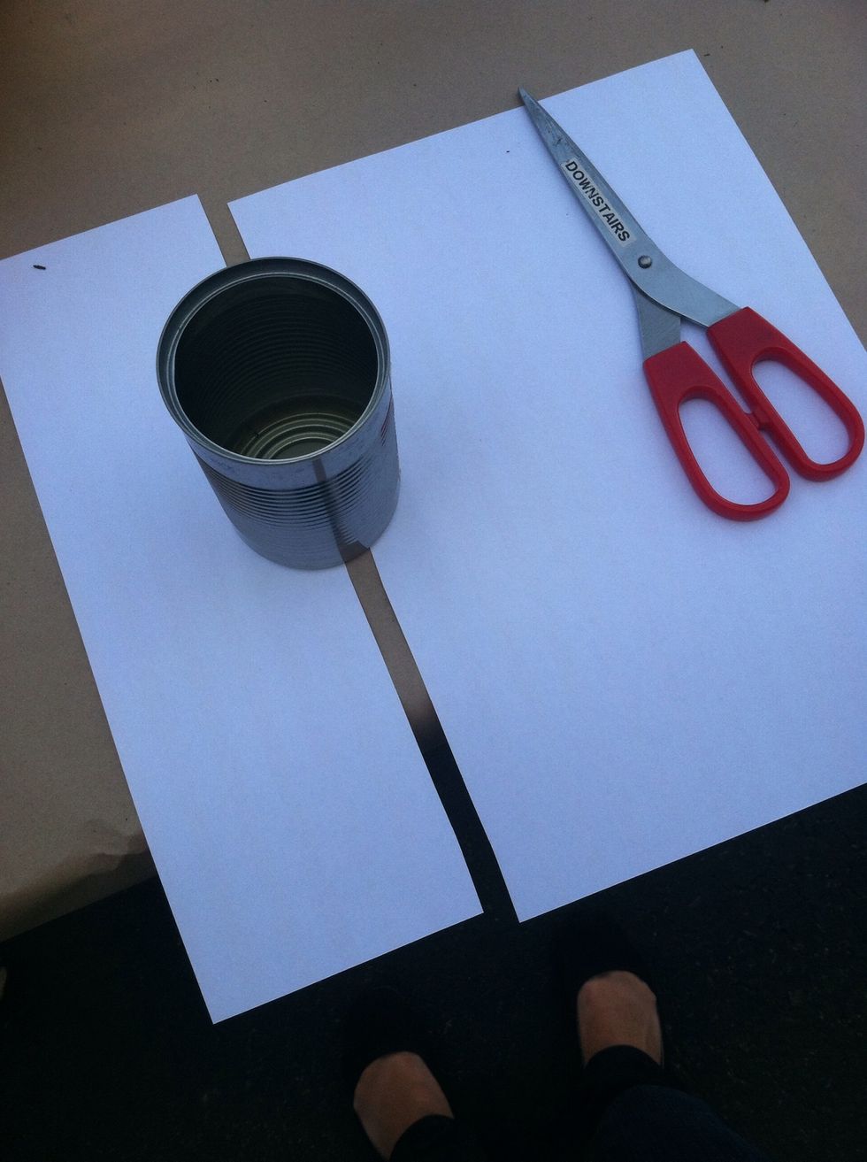 Measure and cut your craft paper to fit your tin can.