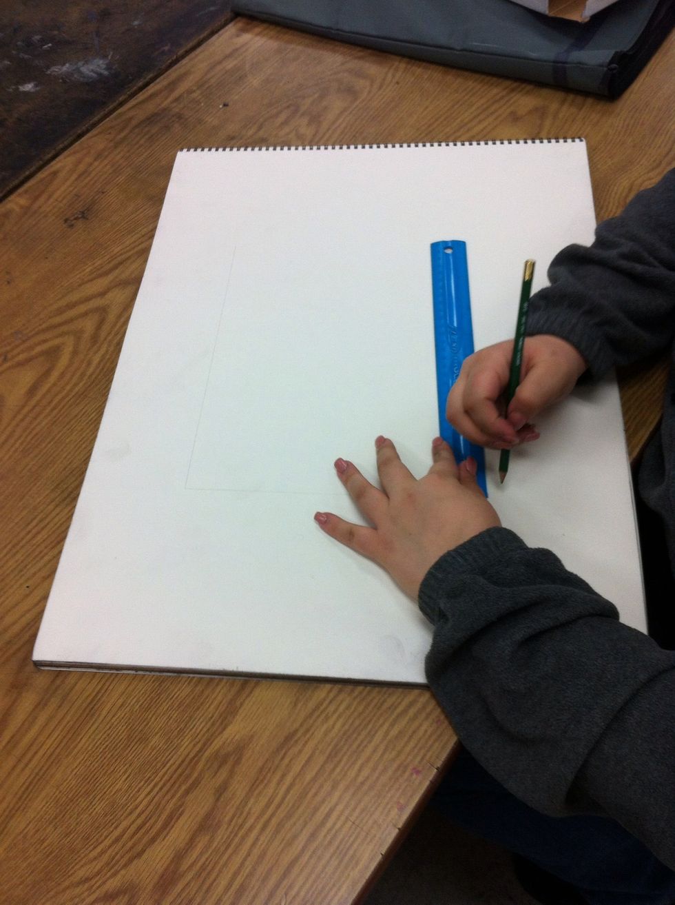 Measure and draw a 10x12 inch rectangle in the center of your paper using your 4H pencil.
