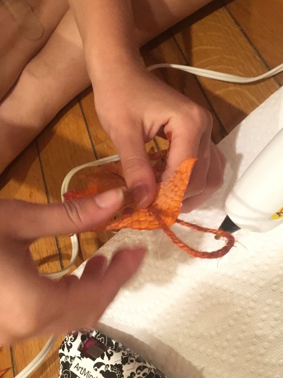 Measure and glue string to leaves so it makes a loop