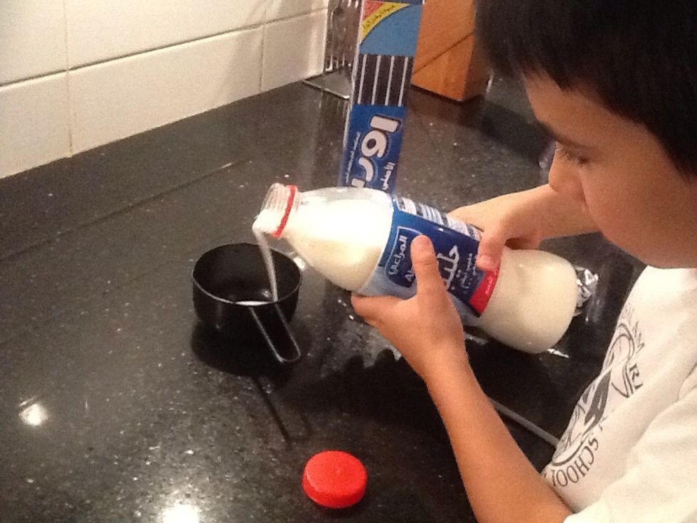 Measure and pour 220 ml of milk put it into the blender