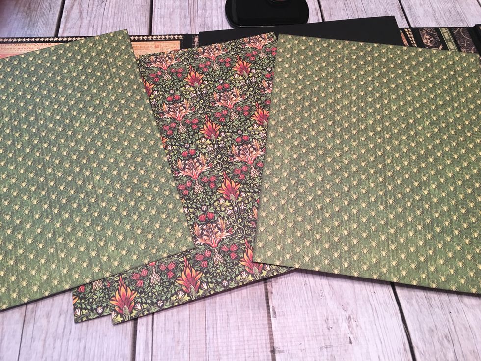 Measure, cut and ink patterned papers to cover each full page and the "half" pages.