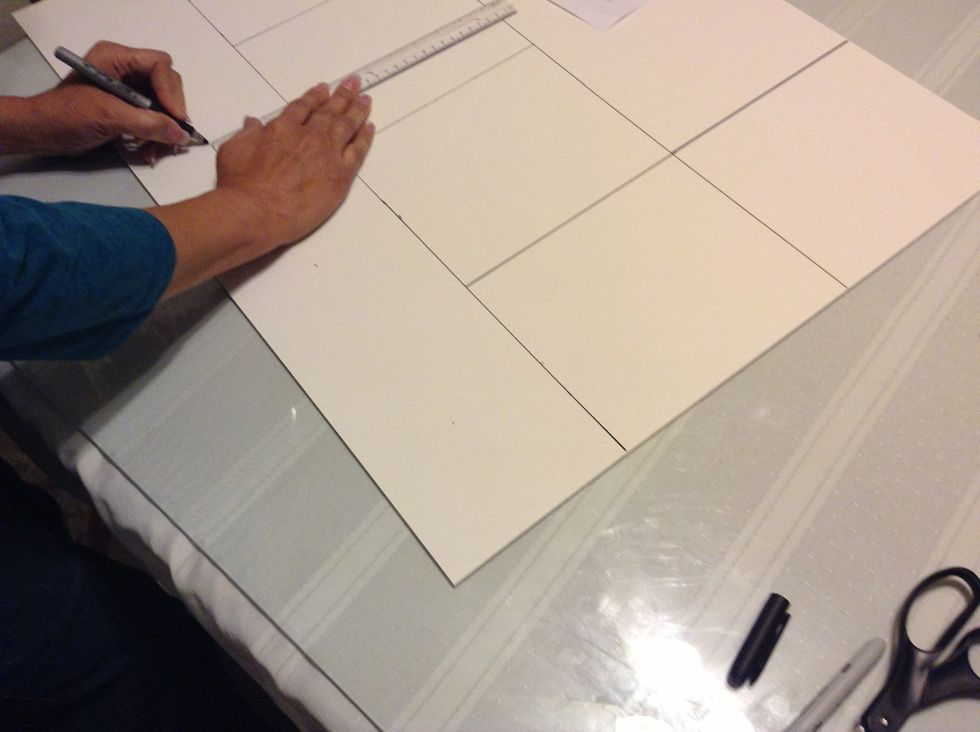 Measure down from the center point 3 1/2 inches. Draw a little dot to mark the spot.