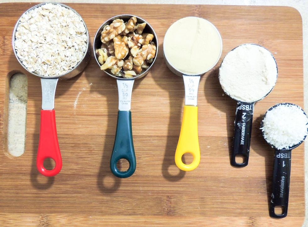 Measure Dry ingredients. 1/2 cup oats, 1/3 cup walnuts, 1/4 cup pea protein, 2 Tablespoons coconut flour.