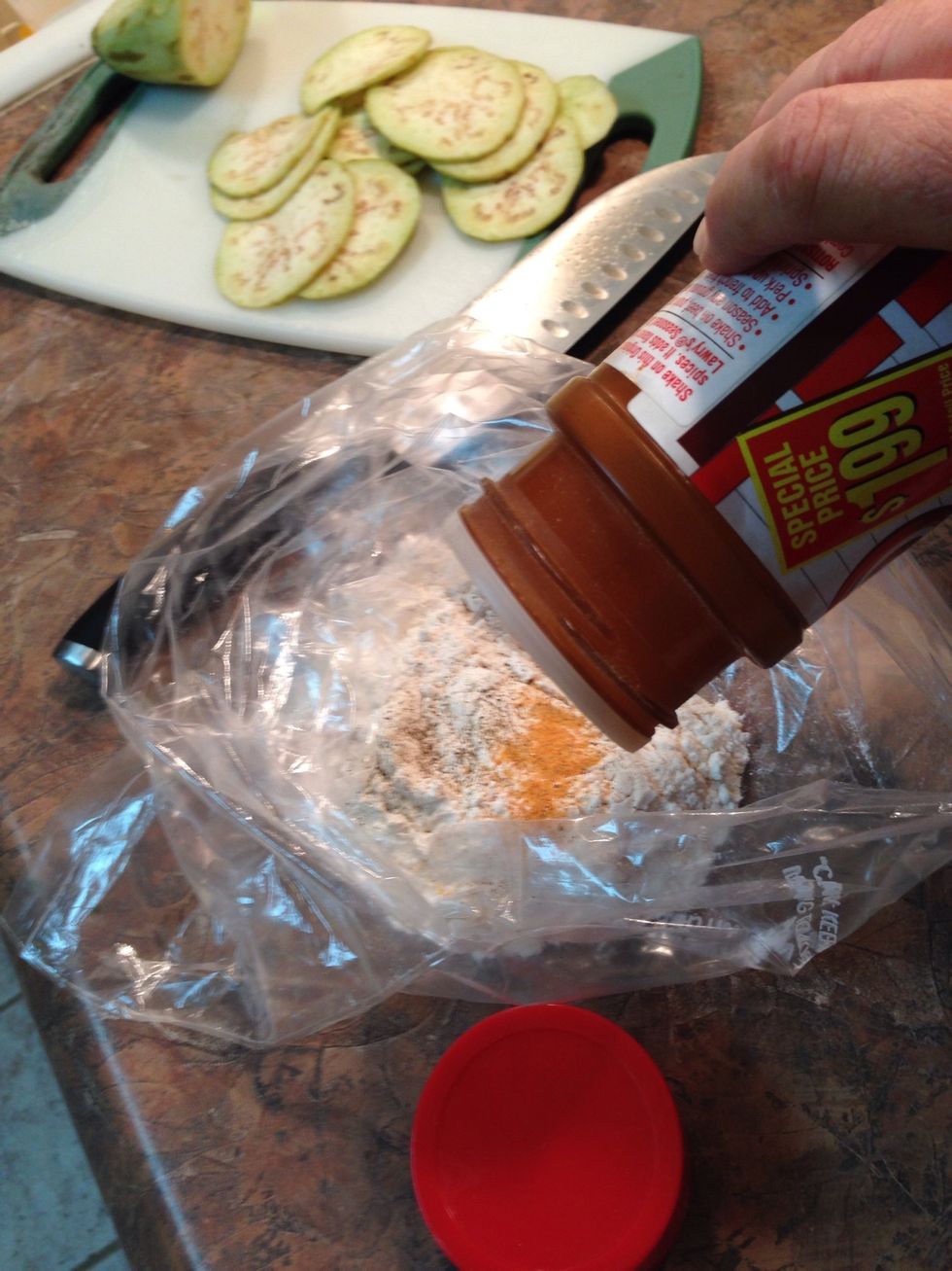 Measure flour, salt & pepper into a gallon plastic bag. I started with a half cup of flour, a few sprinkles of seasoned salt and couple shakes of pepper.