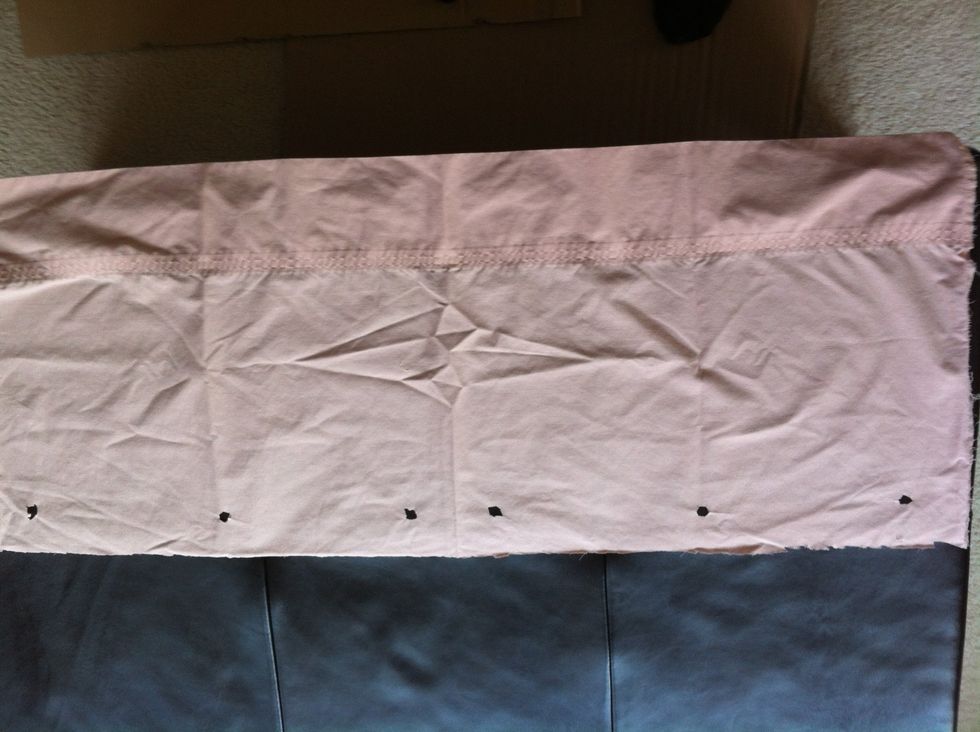 Measure length for curtain opening. With a marker, mark dots for curtain hooks leaving 3-4 inches on top of hole so you can fold it over. I used 10 hooks. Then cut off excess on top and in half.