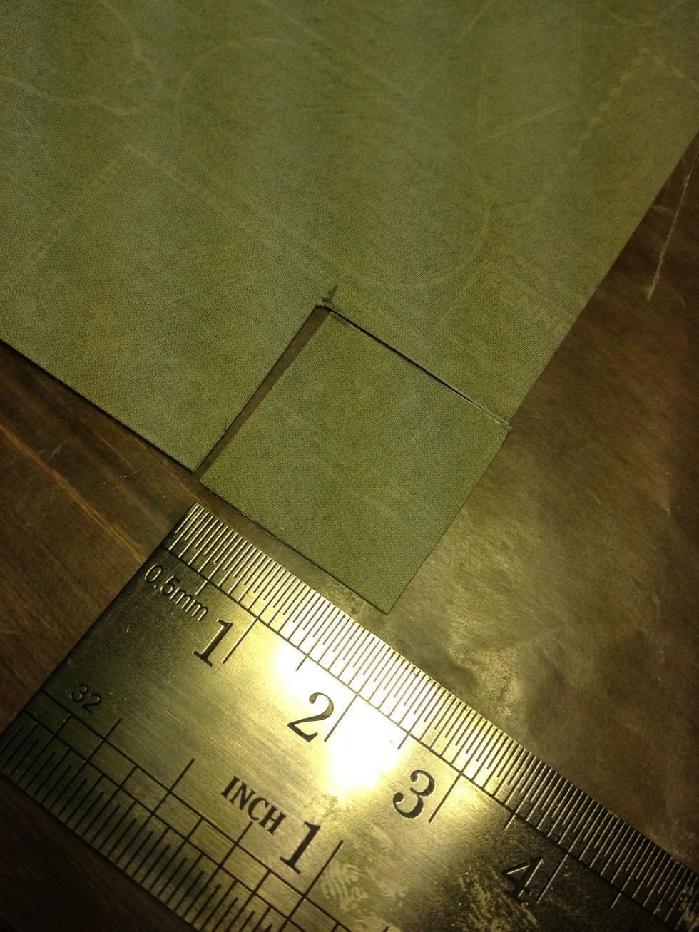 Measure, mark, and cut nine 2cm squares out of your scrapbook papers. I used nine different papers with 2 basic colors that matched my room