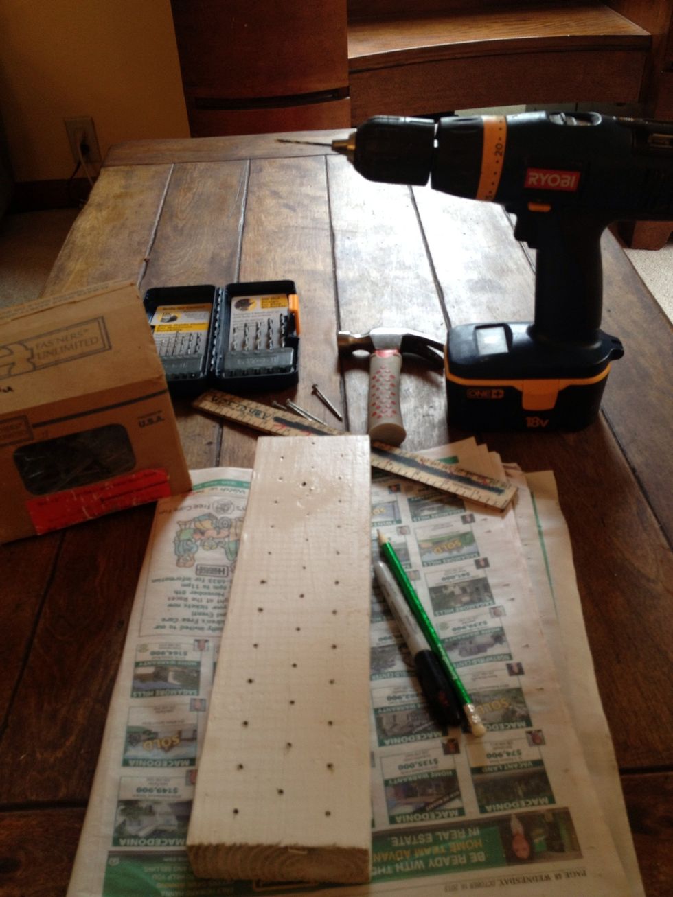Measure & mark the length starting at the 1/2 inch mark & space them 1" apart. (1/2", 1.5", 2.5", 3.5" & so on. Repeat on both outside edges. The middle row should start 1/2" deeper down the board.