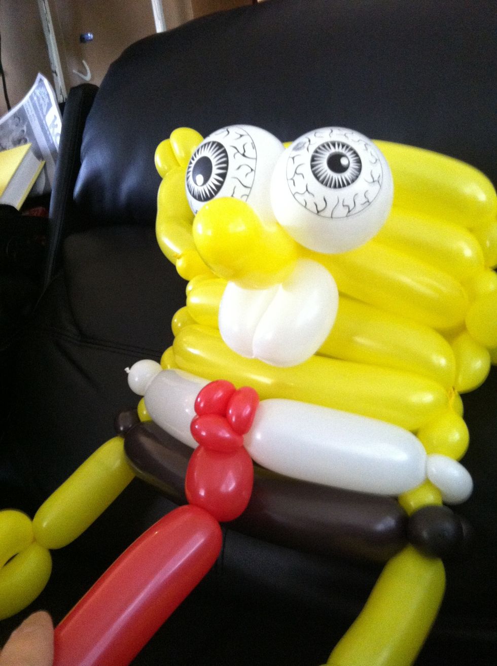 Measure off to appropriate size, twist off, let air out of remainder, tie and cut off extra