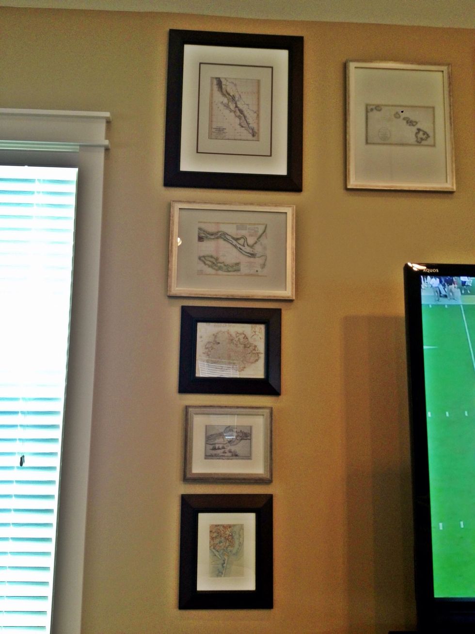 Measure once, measure twice, & measure again. I traced the outline of each frame onto packing paper (looks like a huge roll of craft paper) & cut out the shape. Taped these on the wall as a trial run