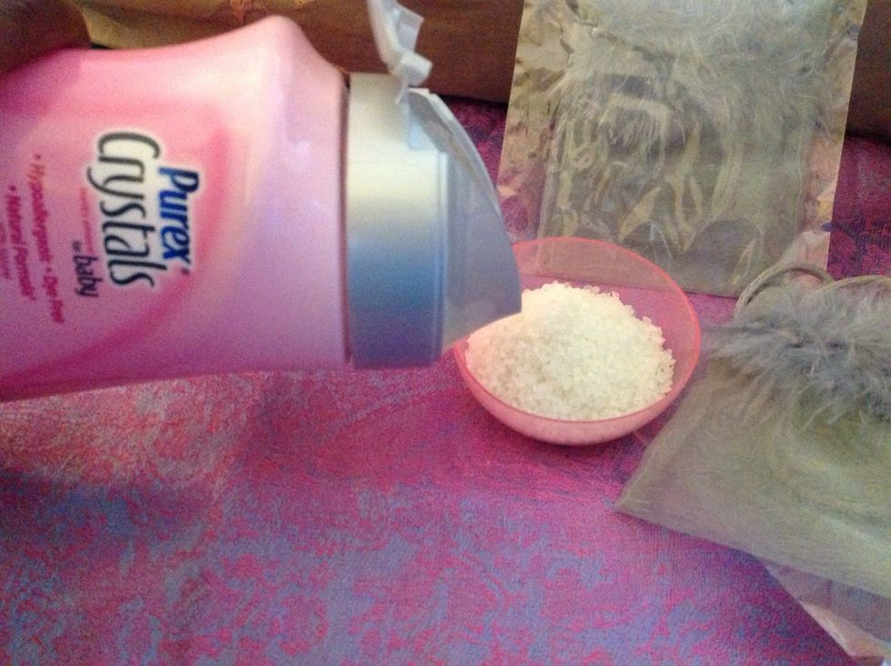 Measure one (1) capful of crystals. I LOVE to use Purex Crystals for baby!