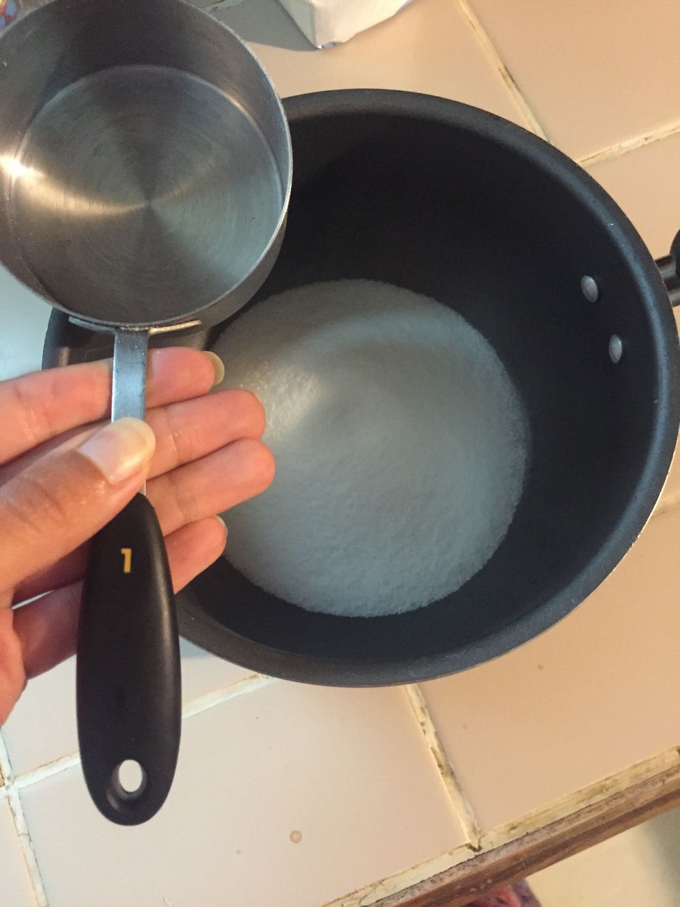 Measure one cup of cane sugar and place in pot. Must be cane sugar! Other sugars do not draw hummingbirds as well, and can contain harmful additives.