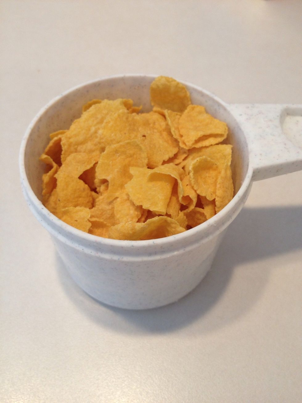Measure one cup of corn flakes.