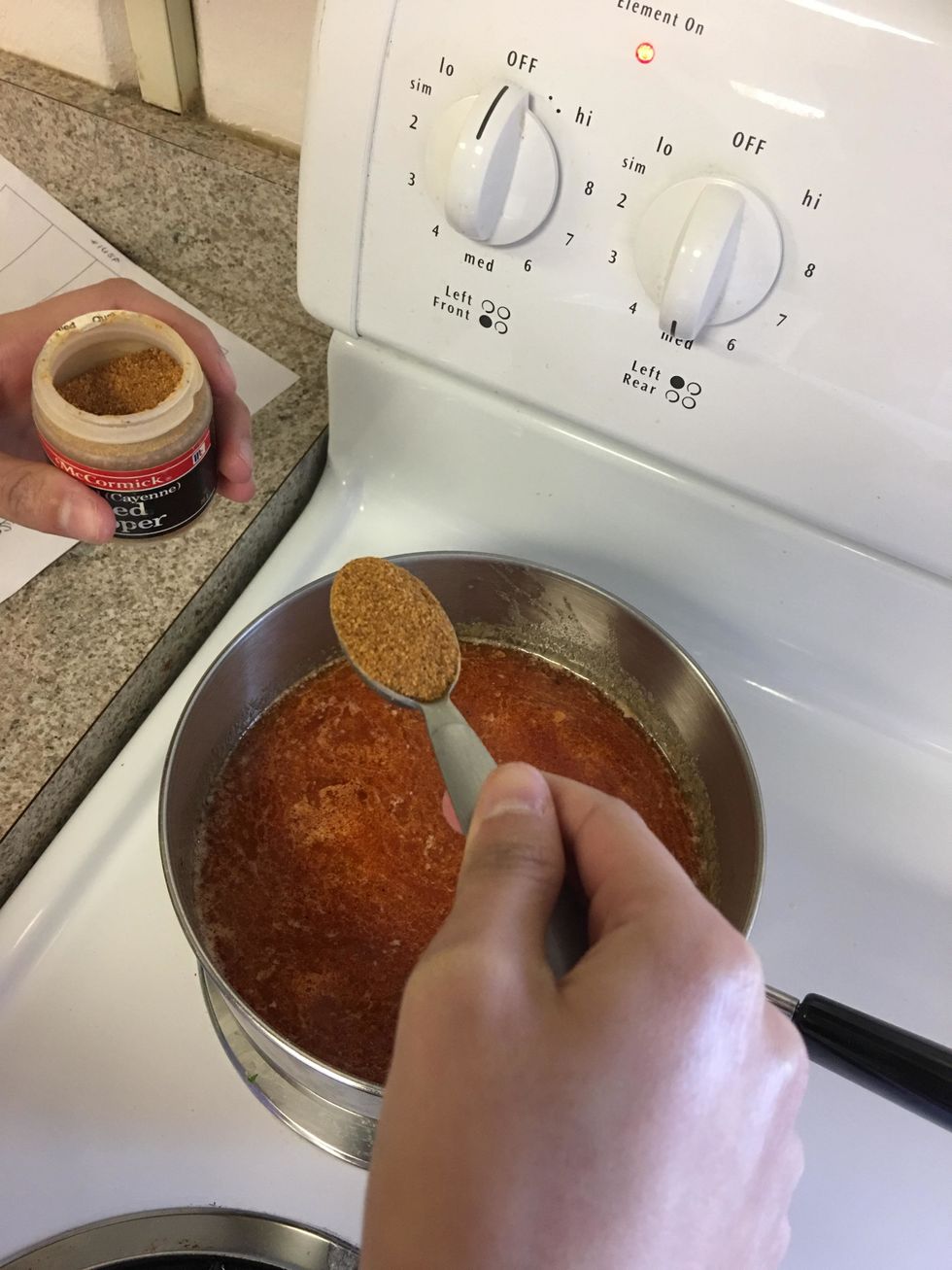 Measure one tbps of Cayenne Pepper and add it to the sauce mixture.