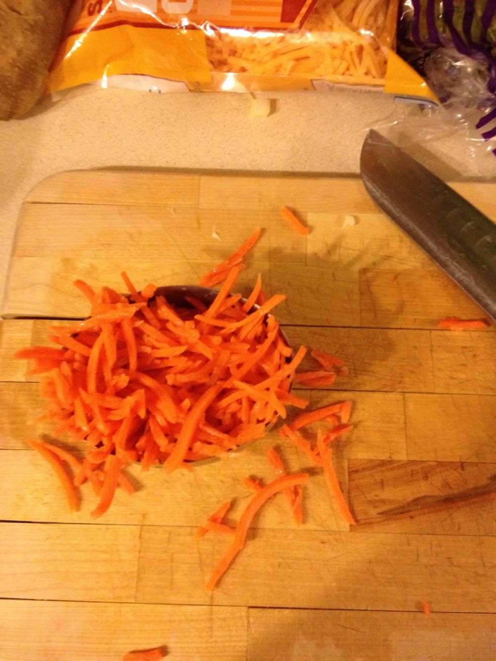 Measure out 1/2 cup shredded carrots I chopped a little to make the shreds smaller. Place in the bowl with the onions.