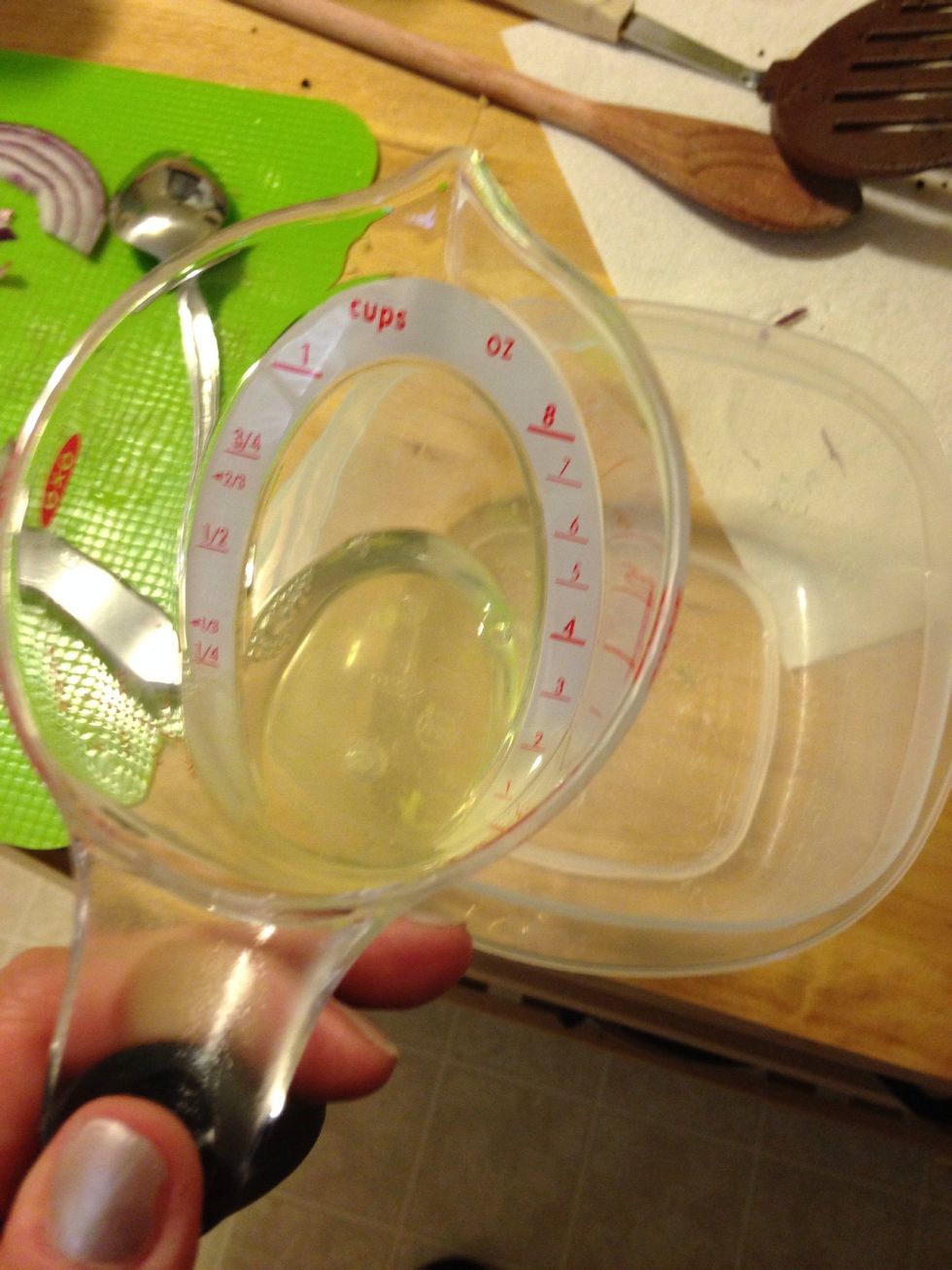 Measure out 1/4 cup of pineapple juice and add to a separate container.