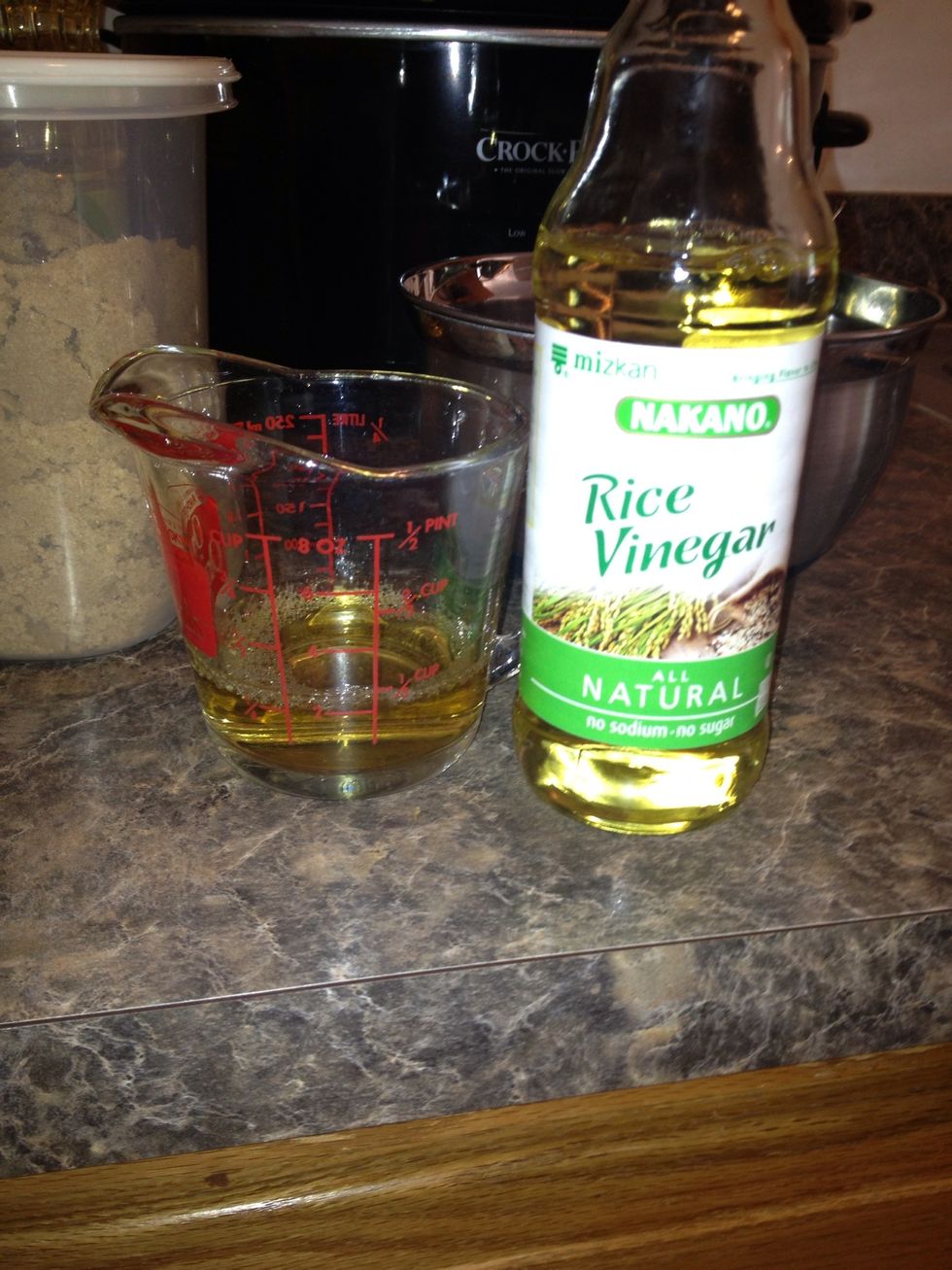 Measure out 1/4 cup rice vinegar.