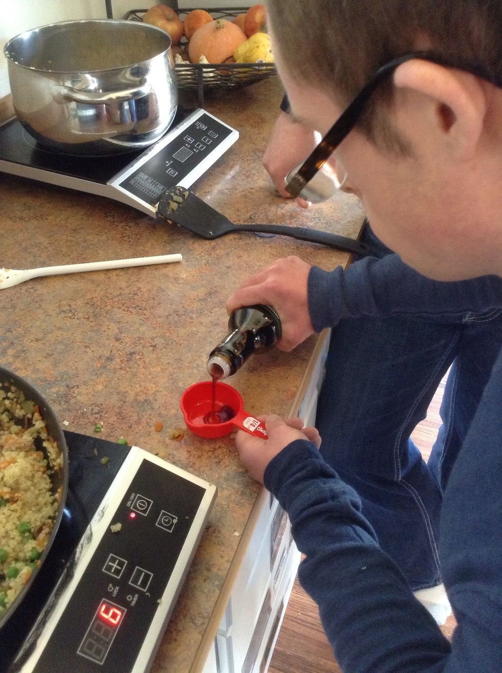 Measure out 1/4 cup soy sauce
