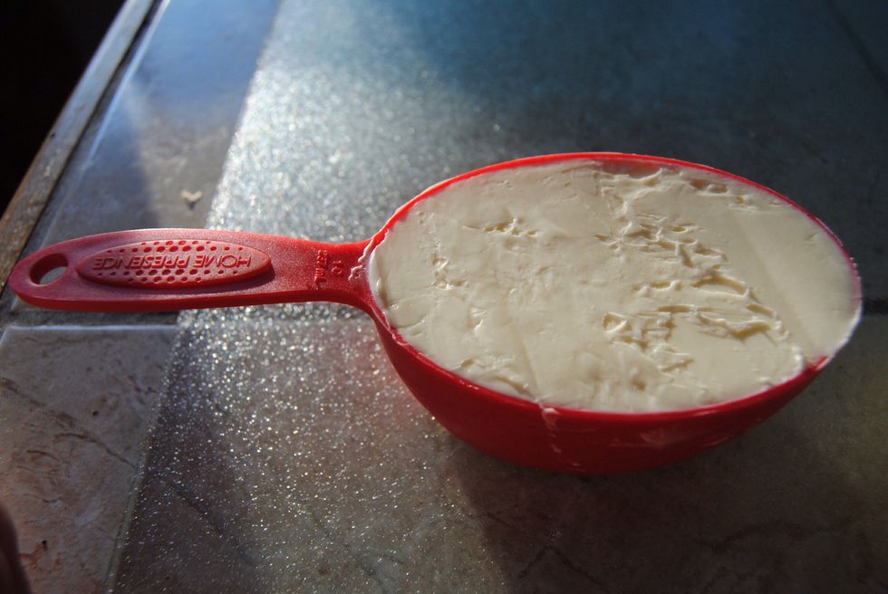 Measure out 1 cup Butter or Margerine and place into pot