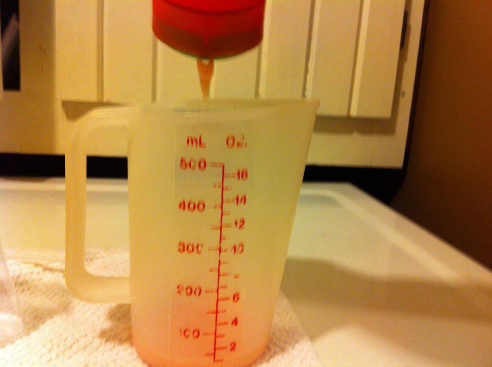 Measure out 2 ounces Favorite Hair Shampoo.