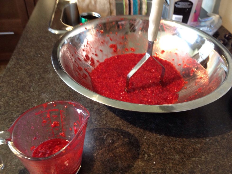 Measure out 4 cups of berries once they are crushed, and place in a clean bowl.