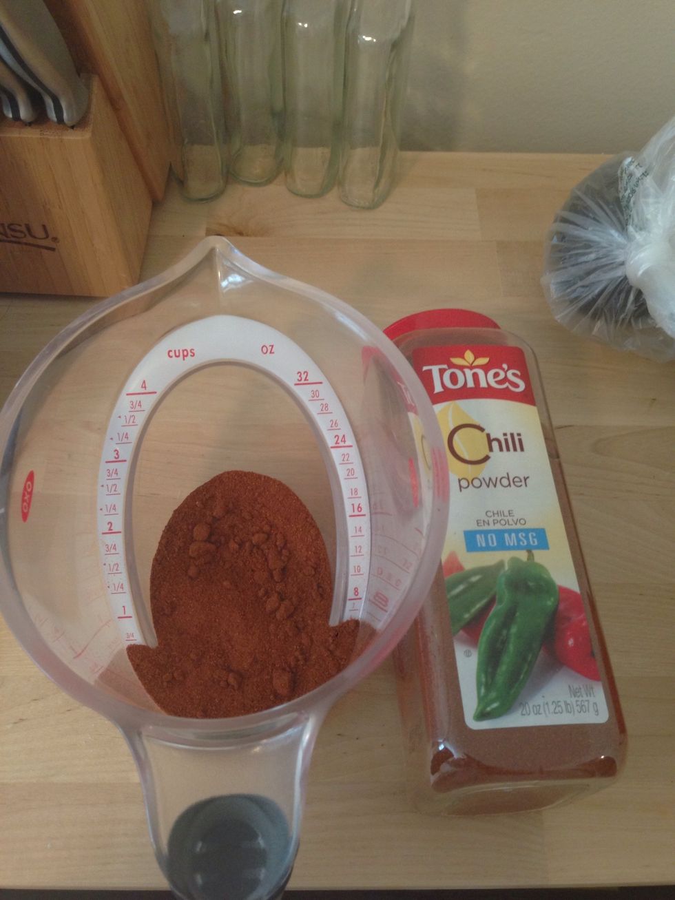 Measure out 5 ounces of chili powder.