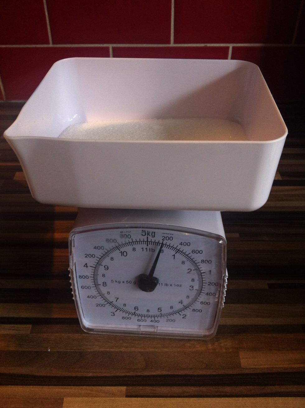 Measure out 7 oz/200 grams of castor sugar.
