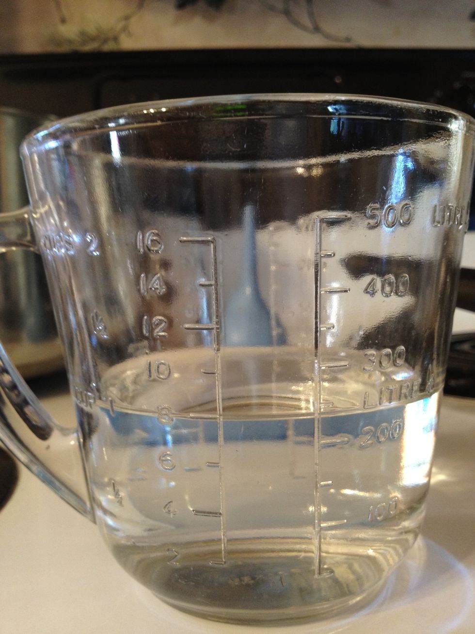Measure out 8 ounces of Distilled water, if not Distilled water then boil tap water. I'm using tap water.