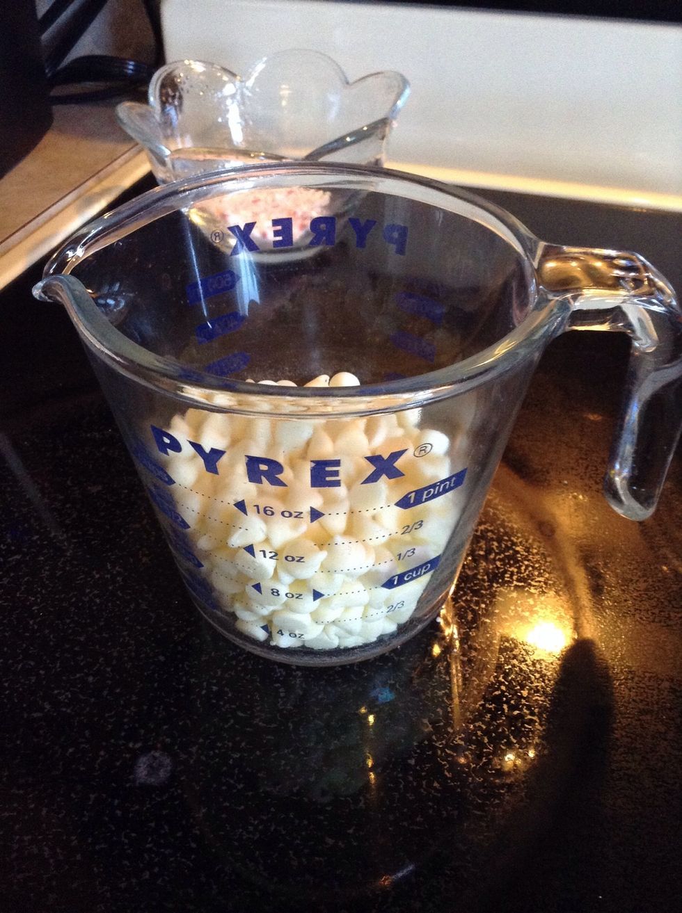 Measure out 8 ounces of white chocolate morsels.