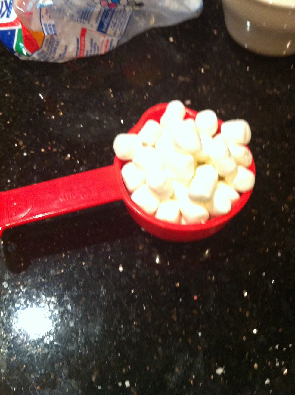 Measure out a half cup of marshmellows