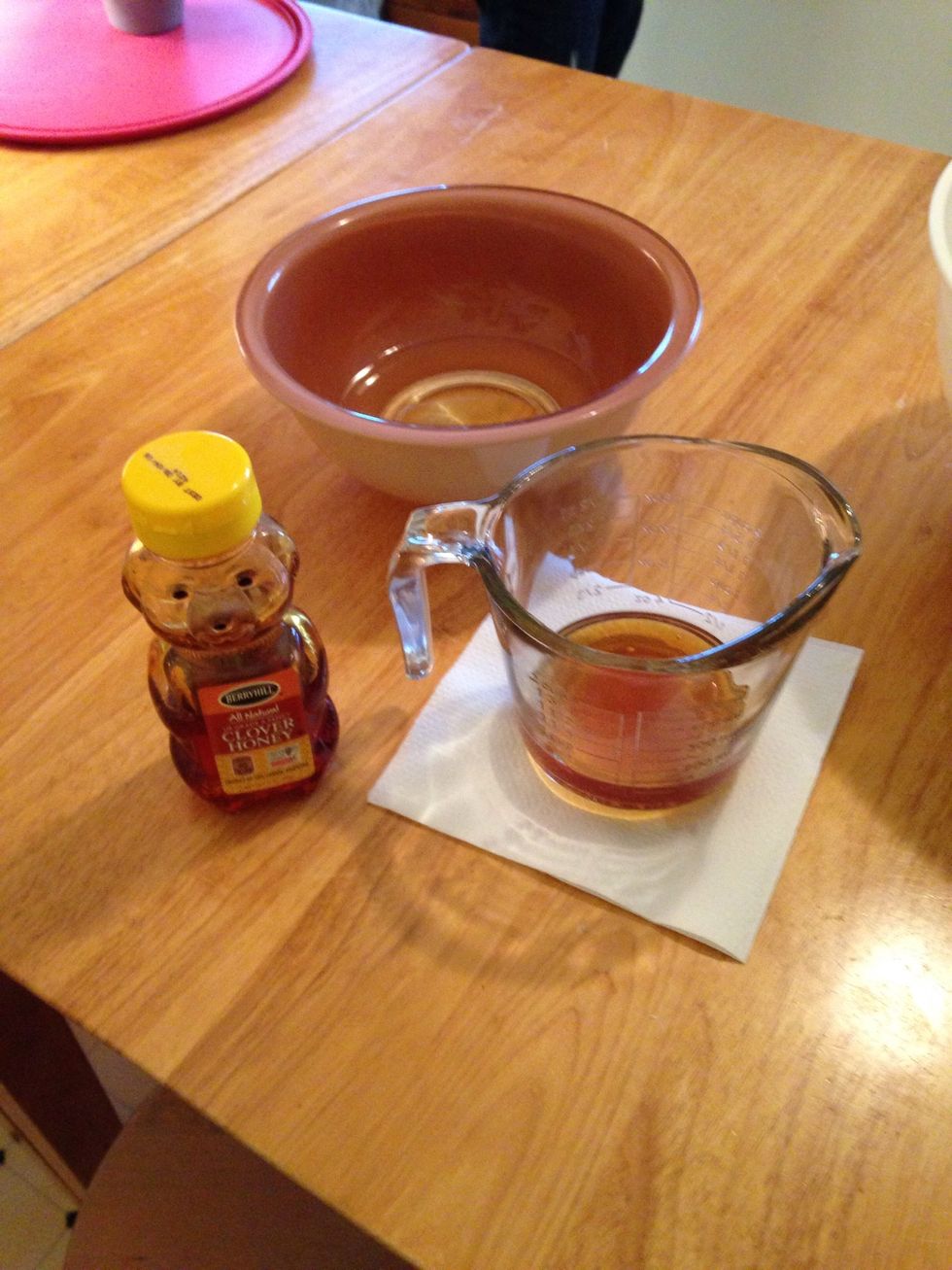 Measure out and add 1/2 cup of honey.
