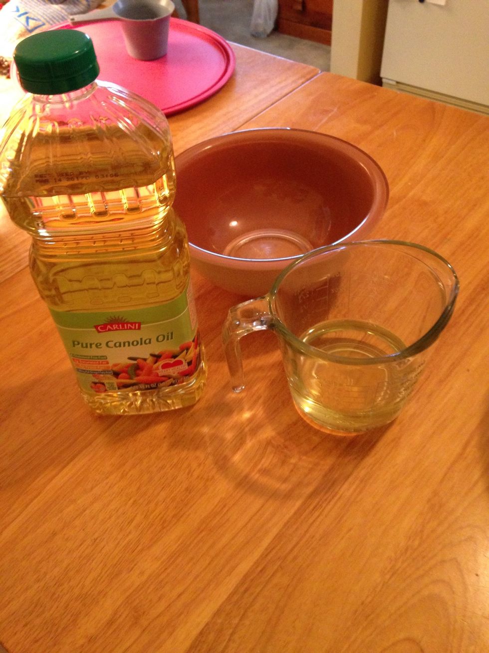 Measure out and add 3/4 cup of canola oil.