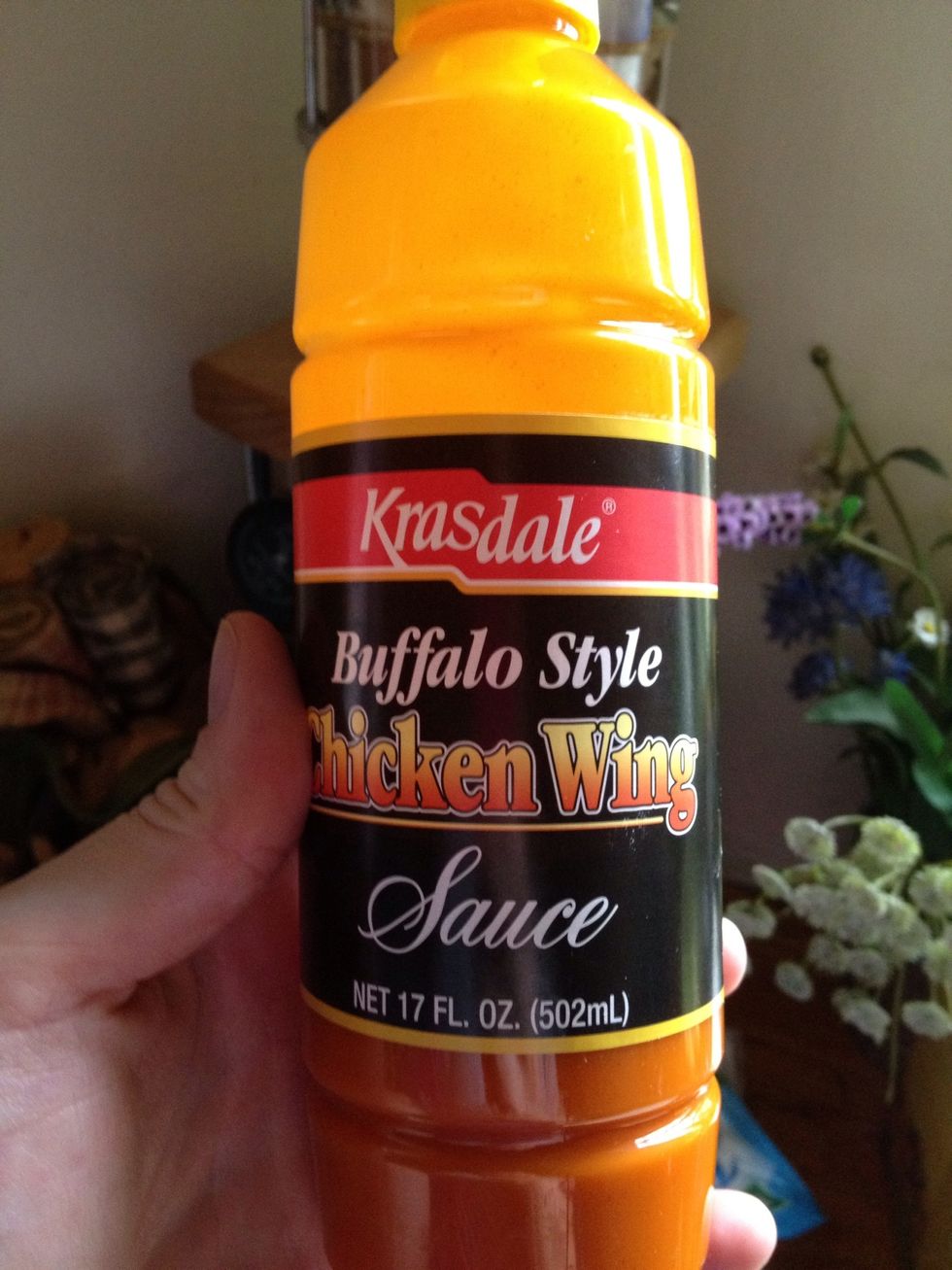 Measure out buffalo chicken wing sauce. Use more or less depending on your tolerance of spicy.