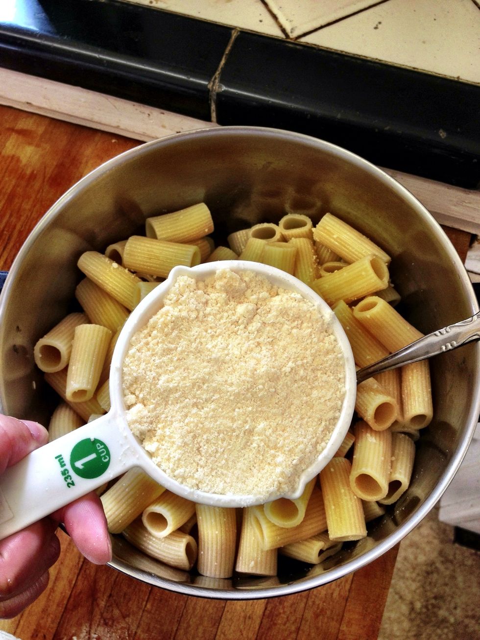 Measure out grated Parmesan cheese.