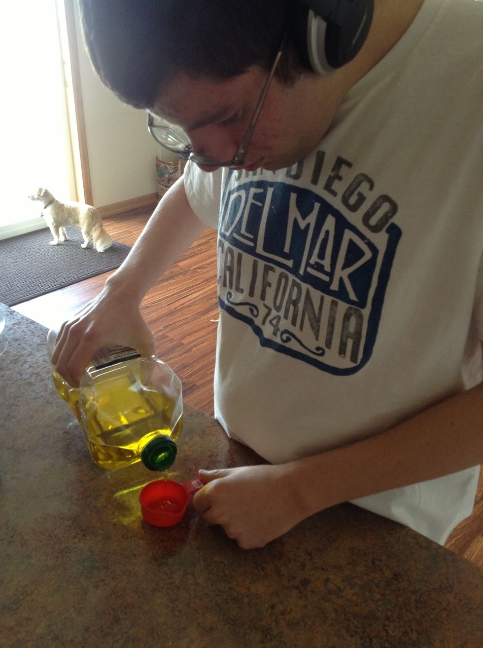 Measure out olive oil