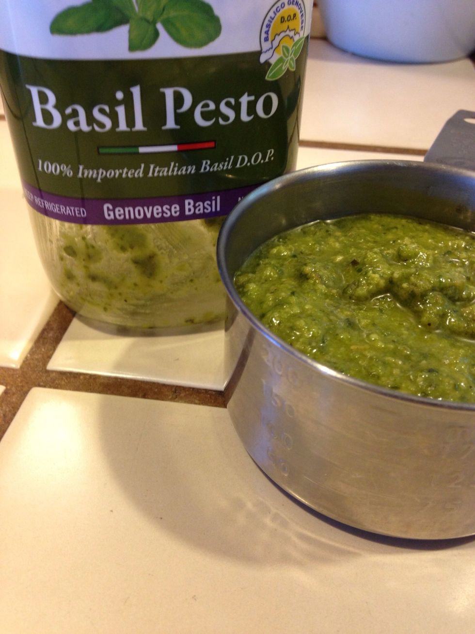 Measure out pesto.