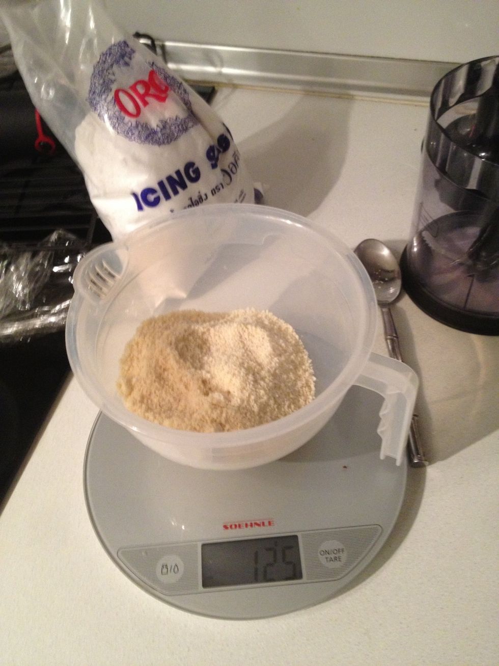 Measure out the almond meal and icing sugar