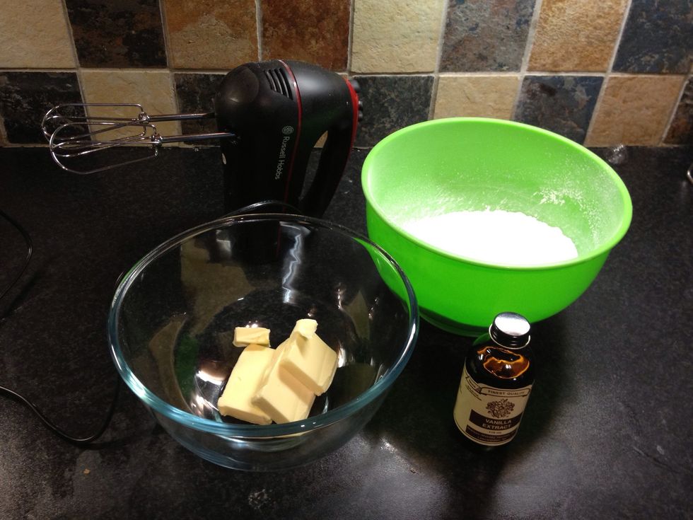 Measure out the butter into one mixing bowl, and the icing sugar into another.
