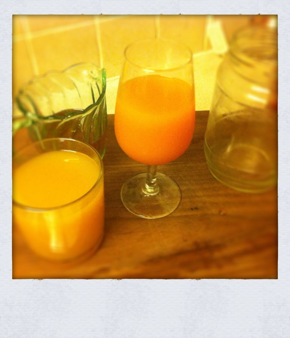 Measure out the quantities of juice. You don't need to be fancy and put them in glasses like we did. You could measure with a measuring jug and then pour into your jar.