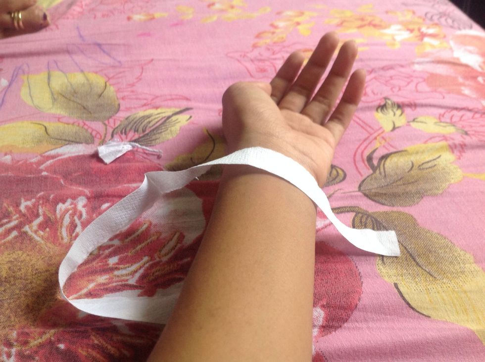 Measure out the size of your wrist and snip off the excess.