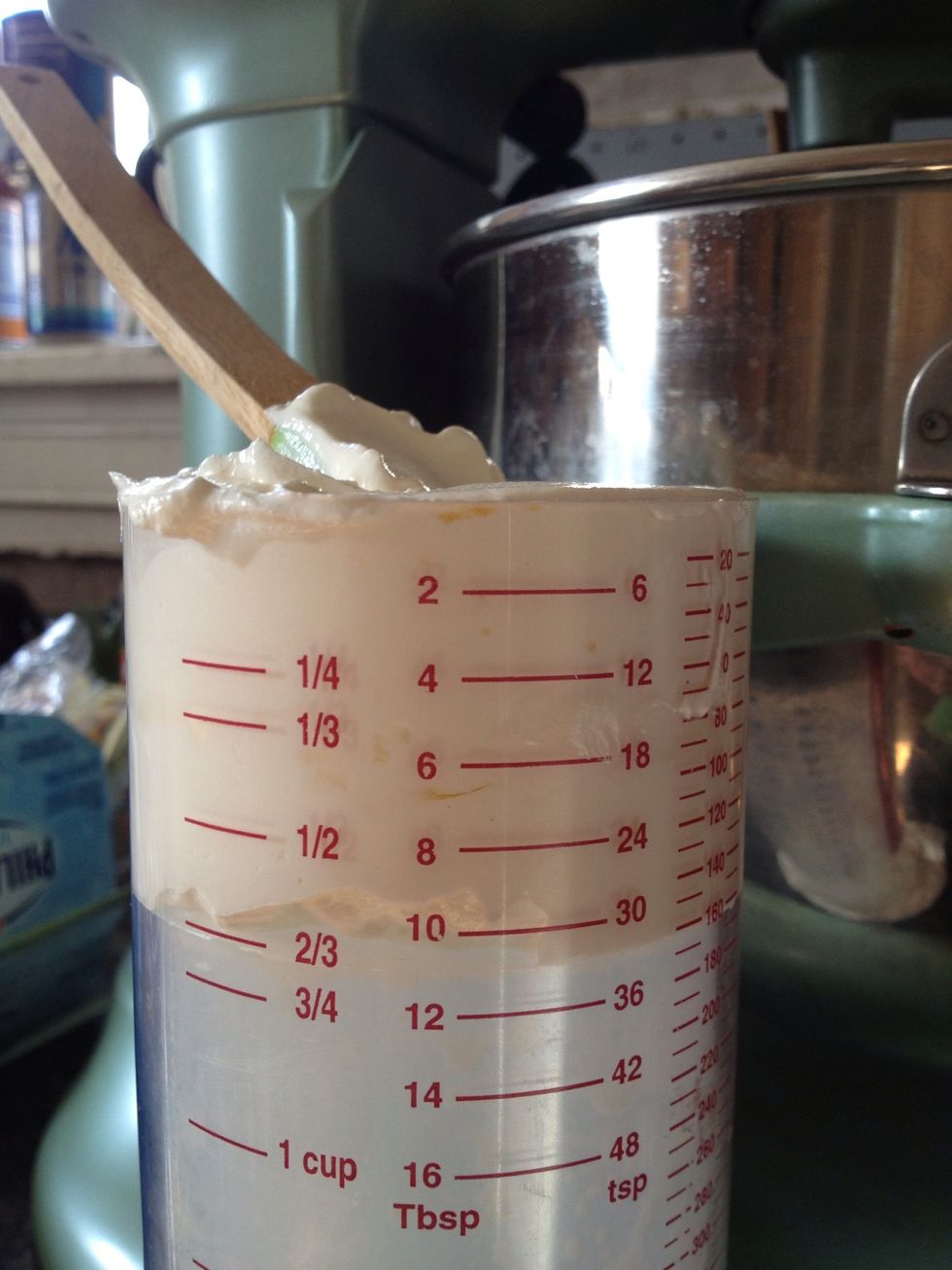 Measure out the sour cream. I love this tool for measuring out thick stuff. Add this to the batch and mix. Scrape sides.