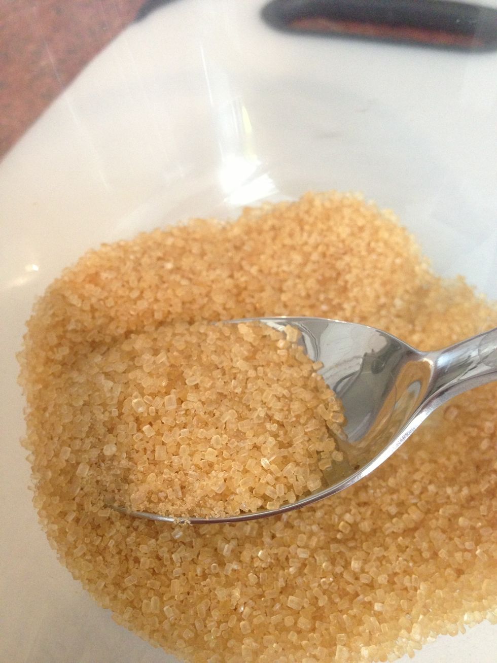 Measure out the sugar (Demerara or brown sugar) and dissolve in approx half a cup (100ml)  of boiling water. You want to make a concentrated syrup with as little water as possible.