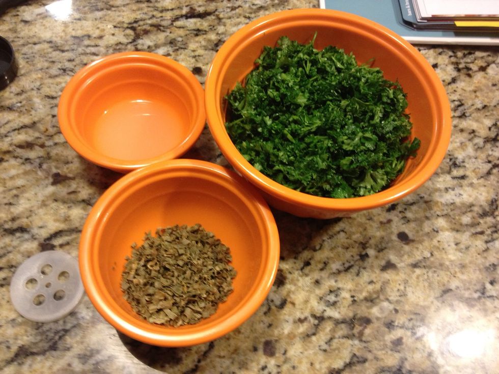Measure out three of the four tablespoons of lemon juice and put it in a small bowl; measure out all of the chives into a bowl and all of the parsley.