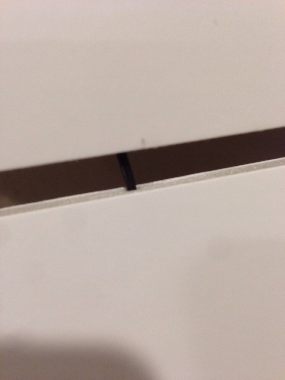 Measure out three of your foam boards to match the total surface area of your map in a way they fit. Then use your tie wire as dowels to hold the boards together.