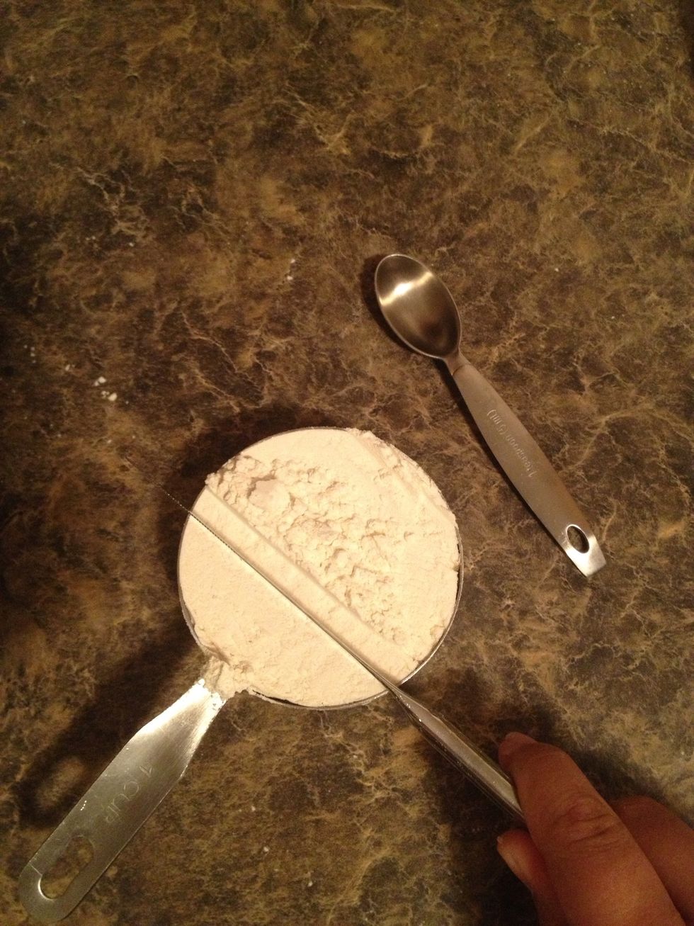 Measure out two cups of flour. I like to use the unbleached flour! Make sure to level it using a straight edge knife. Don't pack the flour.